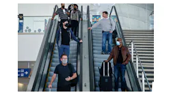SAN JOSE, CALIFORNIA - APRIL 13: Most travelers wear masks while heading to baggage claim at the Norman Y. Mineta San Jose International Airport in San Jose, Calif., on Wednesday, April 13, 2022. The CDC extended the travel mask mandate for another 15 days.