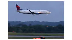 A Delta airplane lands at the Hartsfield-Jackson Atlanta International Airport, Wednesday, June 1, 2022, in Atlanta.