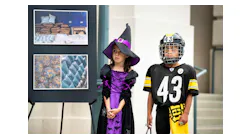 Serena Wright, 5, and Dylan Garrett, 8, attend a news conference at Pasadena City Hall, where officials warn about the possibility of fentanyl being mixed in with candy this Halloween on Thursday, October 27, 2022.