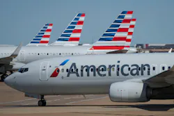 American Airlines planes are seen at the gates of Terminal C at Dallas/Fort Worth International Airport on Saturday, Oct. 16, 2021. In 2019, the FAA approached American Airlines and told the airline it had been using only about 200 of the 216 slots it had been assigned at the time. American Airlines planes are seen at the gates of Terminal C at Dallas/Fort Worth International Airport on Saturday, Oct. 16, 2021. In 2019, the FAA approached American Airlines and told the airline it had been using only about 200 of the 216 slots it had been assigned at the time.