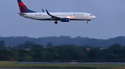 A Delta airplane lands at the Hartsfield-Jackson Atlanta International Airport, Wednesday, June 1, 2022, in Atlanta, Georgia.