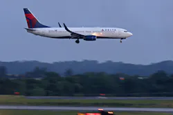 A Delta airplane lands at the Hartsfield-Jackson Atlanta International Airport, Wednesday, June 1, 2022, in Atlanta, Georgia. A Delta airplane lands at the Hartsfield-Jackson Atlanta International Airport, Wednesday, June 1, 2022, in Atlanta, Georgia.