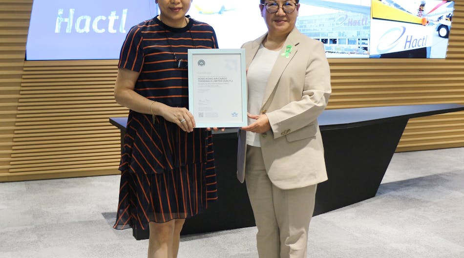 Hactl executive director and chief financial officer Amy Lam (right) receives the IATA CEIV Lithium Batteries certificate from Yvonne Ho, IATA general manager, Hong Kong and Macau.