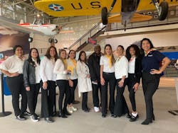 Several Latinas in Aviation Vol. I and II authors join Fig Factor Media CEO Jacqueline S. Ruiz, center left, and FAA Deputy Bradley Mims during the Second Annual Global Fest.