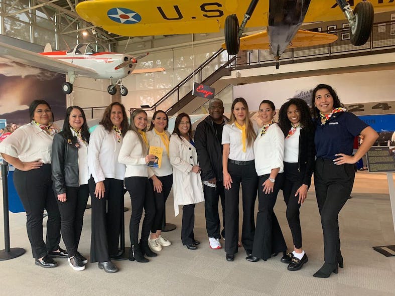 Several Latinas in Aviation Vol. I and II authors join Fig Factor Media CEO Jacqueline S. Ruiz, center left, and FAA Deputy Bradley Mims during the Second Annual Global Fest.