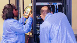 Lockheed Martin employees working on the Processor-in-the-loop testbed for Next Generation Interceptor (NGI).