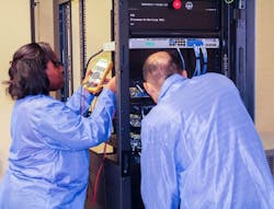 Lockheed Martin employees working on the Processor-in-the-loop testbed for Next Generation Interceptor (NGI).