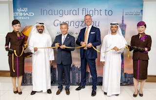 Officials taking part in the ribbon-cutting ceremony for inaugural flight to Guangzhou (left to right): H.E Mohamed Al Zaabi, CEO of Miral Asset Management; H.E. Chinese Ambassador Yiming Zhang to the UAE; Tony Douglas, Group CEO of Etihad Aviation Group; His Excellency Dr. Jamal Al Dhaheri, MD &amp; CEO of Abu Dhabi Airports Company.