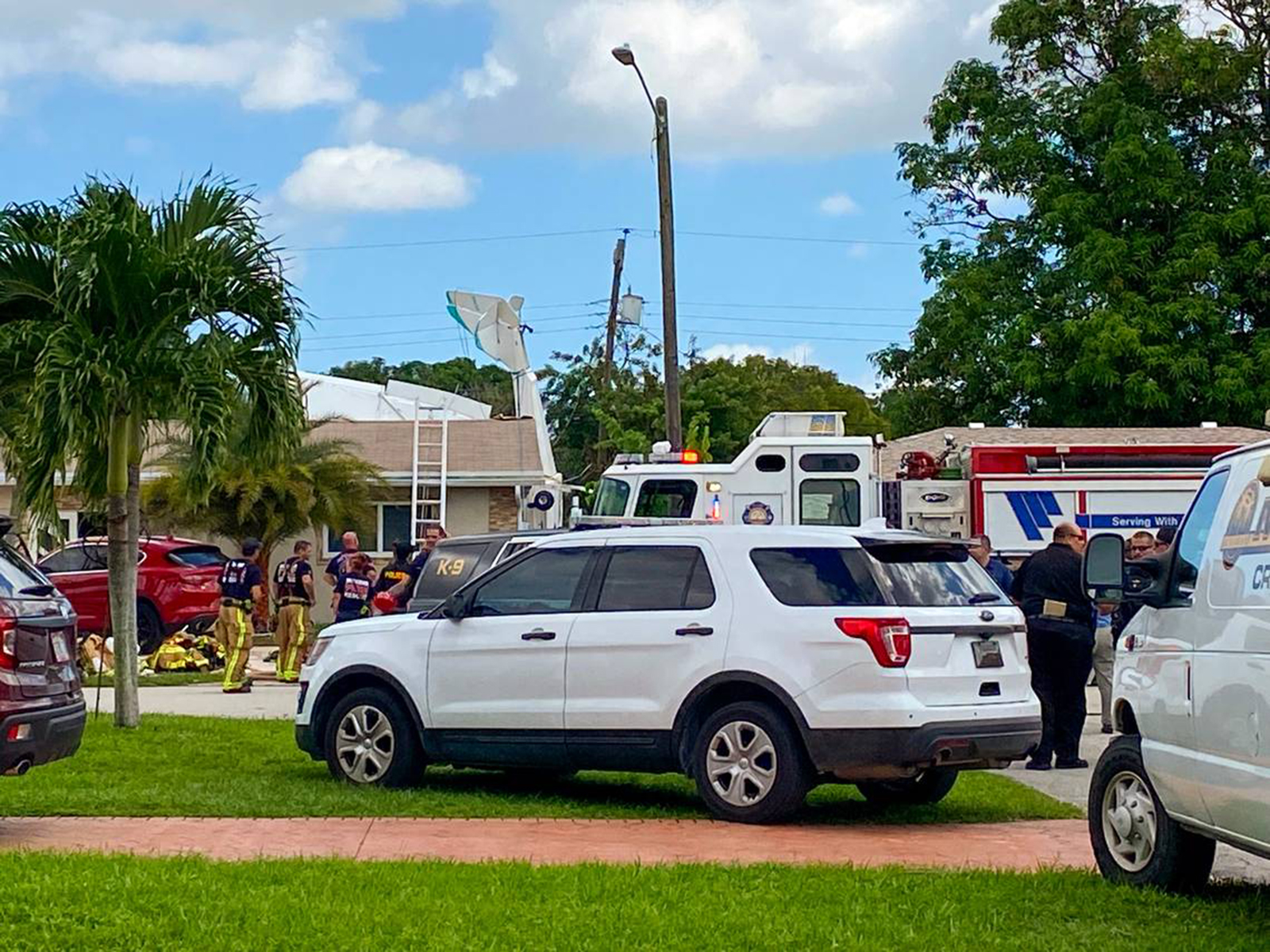 A view of the scene of a small plane crashed into a house located at 2200 block of Jamaica Drive near North Perry Airport in Pembroke Pines on Monday, Oct. 17, 2022, in Miramar, Florida.