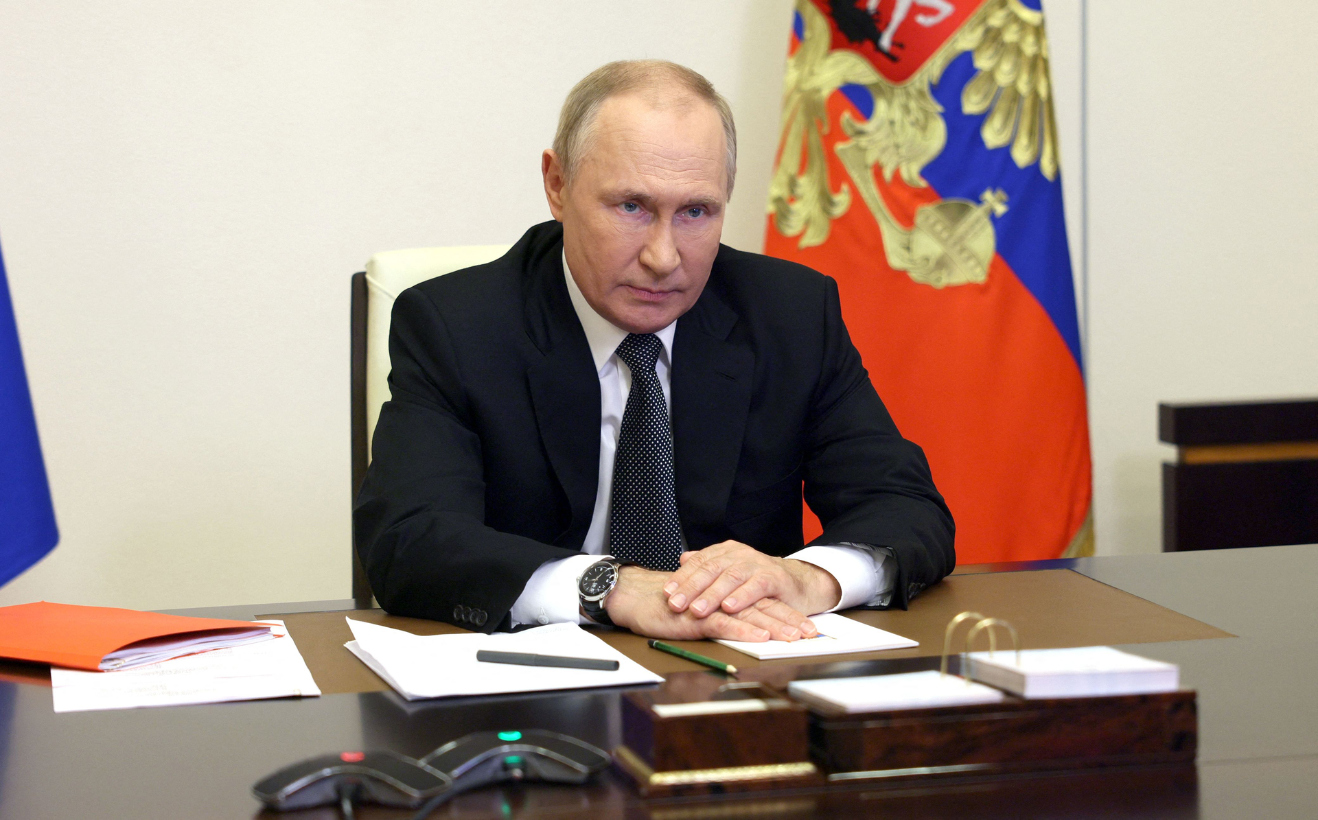 Russian President Vladimir Putin chairs a Security Council meeting via a video link at the Novo-Ogaryovo state residence outside Moscow on Oct. 19, 2022. Vladimir Putin introduced martial law in Ukraine's Donetsk, Lugansk, Kherson and Zaporizhzhia regions that Moscow claims to have annexed.