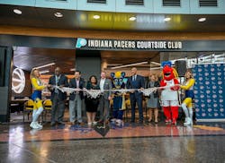 October 11, officials from the Indianapolis Airport Authority, Pacers Sports & Entertainment, and restaurant representatives from HMSHost and Diversified Concessions Group cut the “net” on the new Pacers landmark that will offer a lounge and full-menu, sit-down dining before TSA security checkpoints – making the Pacers-branded experience available to all airport guests. October 11, officials from the Indianapolis Airport Authority, Pacers Sports & Entertainment, and restaurant representatives from HMSHost and Diversified Concessions Group cut the “net” on the new Pacers landmark that will offer a lounge and full-menu, sit-down dining before TSA security checkpoints – making the Pacers-branded experience available to all airport guests.