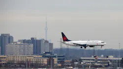 An Air Canada Boeing 737 MAX 8 jet approaches Toronto Pearson International Airport for landing on March 13, 2019, in Toronto.