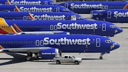 Southwest Airlines Boeing 737 MAX aircraft are parked on the tarmac after being grounded, at the Southern California Logistics Airport in Victorville, California on March 28, 2019.