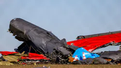 A damaged plane remains in the open field at the Dallas Executive Airport on Sunday, Nov. 13, 2022, after a Boeing B-17 Flying Fortress and a Bell P-63 Kingcobra crash a day earlier. A damaged plane remains in the open field at the Dallas Executive Airport on Sunday, Nov. 13, 2022, after a Boeing B-17 Flying Fortress and a Bell P-63 Kingcobra crash a day earlier.