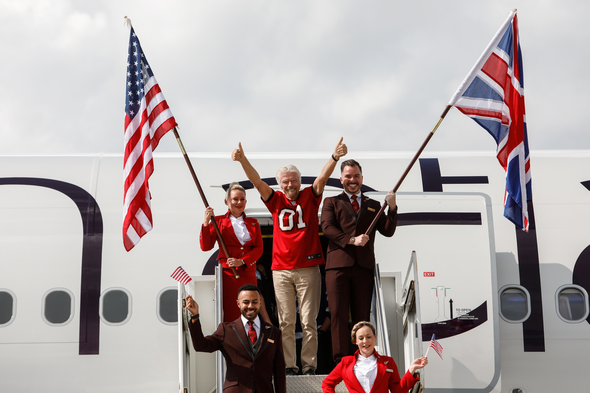 Virgin Atlantic founder and president Sir Richard Branson greets the crowd, after an airplane lands at Tampa International Airport on Wednesday, Nov. 2, 2022, in Tampa.