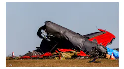 Damage from a Boeing B-17 Flying Fortress and a Bell P-63 Kingcobra crash a day earlier remains at the Dallas Executive Airport on Sunday, Nov. 13, 2022.