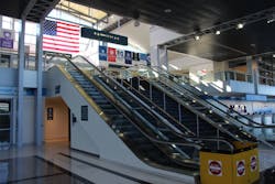 Worcester Regional Airport doesn't see many passengers during COVID-19 but still displays notices advising passengers about the virus.