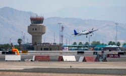 A plane comes in for a landing at the North Las Vegas Airport on Monday, Aug. 8, 2022.