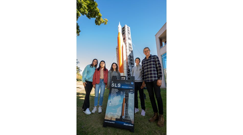 Student employees in the Industry Design Experience for Auburn Students, or IDEAS, program stand by a blow-up replica of the Space Launch System they are working on. Pictured are&amp; Regan Clare, junior in mechanical engineering; Ashley Eng, junior in mechanical&amp; engineering; Jessica Ruiz, junior in mechanical&amp; engineering; Matthew Gillis, senior in mechanical&amp; engineering&amp; and applied mathematics; and Bradley Conrad, senior in mechanical engineering.