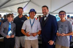 Scholarship winners and presenters (L-R): Landon Bosco, Epic Founder and CEO Danny Perna, Aaron Perez, New Smyrna Beach Mayor Russ Owen, and Austin White (Not pictured: Ethan Harpending and Roland Ireland) Scholarship winners and presenters (L-R): Landon Bosco, Epic Founder and CEO Danny Perna, Aaron Perez, New Smyrna Beach Mayor Russ Owen, and Austin White (Not pictured: Ethan Harpending and Roland Ireland)