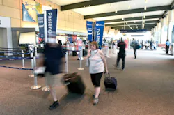 Passengers move through Bradley International Airport, Thursday, June 30, 2022.