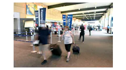 Passengers move through Bradley International Airport, Thursday, June 30, 2022.