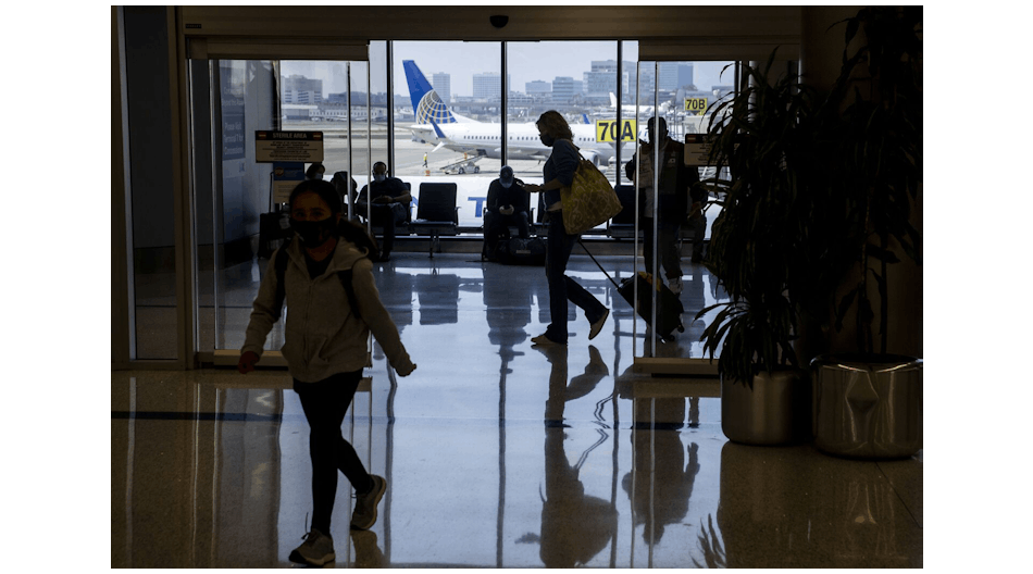 Air travelers navigate Terminal 7 at Los Angeles International Airport. The Department of Homeland Security has pushed back its deadline for travelers to possess a Real ID to May 5, 2025.