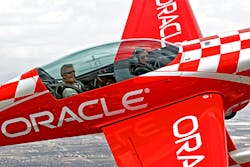 Young Eagles chairman Sean D. Tucker (left), a legionary air show performer, flies with Nolan Hart over California in 2016.
