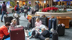 Canceled and delayed flights at Orlando International Airport caused by the winter storm left people to wait for flights in Orlando, Florida, Dec. 26, 2022.