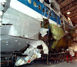 In this photo from Jan. 31, 2001, the 'shatter zone' portion of the reconstructed fuselage of Pan Am Flight 103, which exploded over Lockerbie, Scotland, in 1988, is on display in Edinburgh, Scotland. In this photo from Jan. 31, 2001, the 'shatter zone' portion of the reconstructed fuselage of Pan Am Flight 103, which exploded over Lockerbie, Scotland, in 1988, is on display in Edinburgh, Scotland.