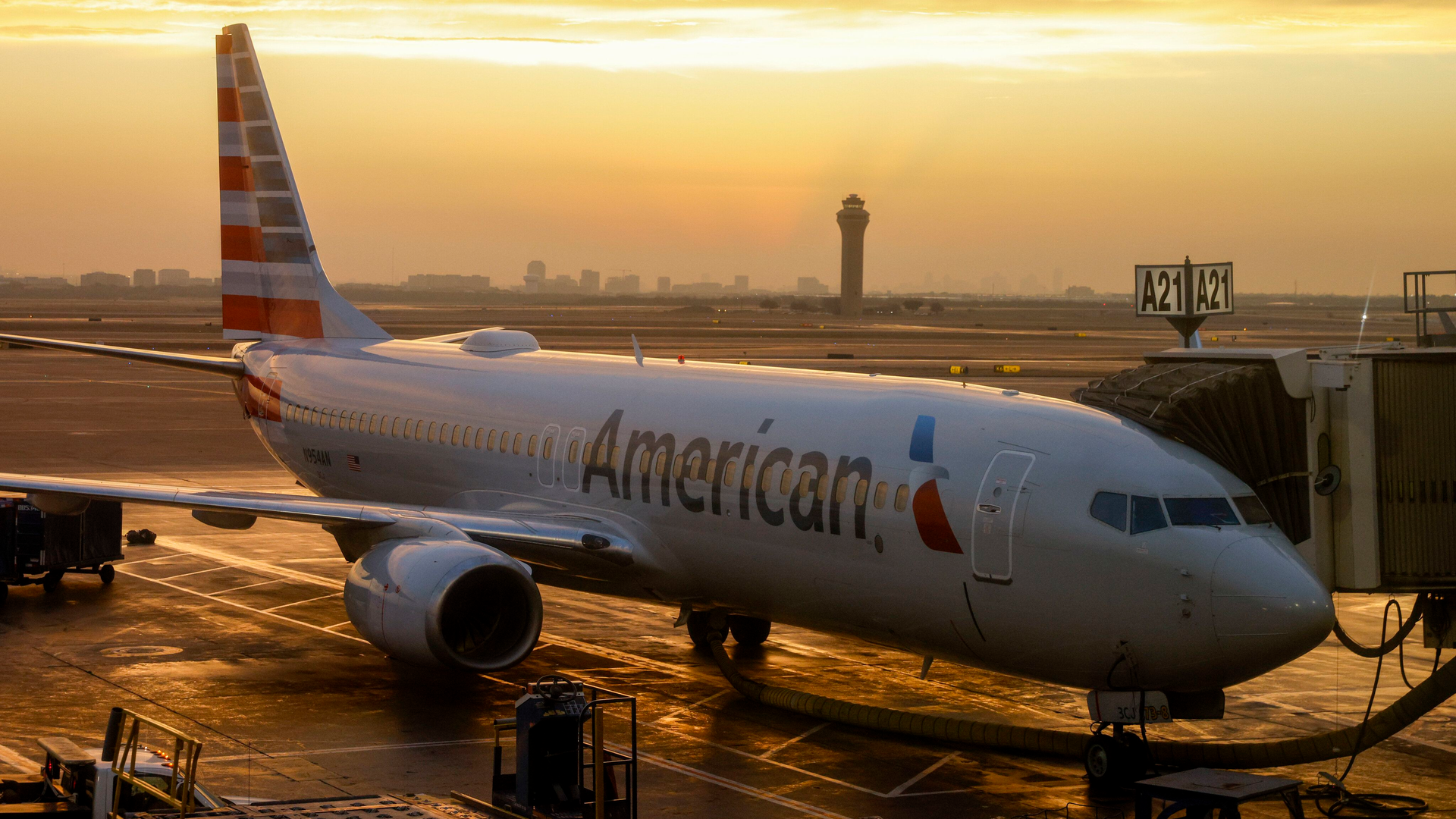 An American Airlines Boeing 737-800 sits at a gate at Terminal A at DFW International Airport on Dec. 29.