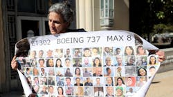 Nadia Millerson, the mother of Samya Stumo who was killed in one of the two plane crashes involving a Boeing 737 MAX, unfurls a banner with photographs of some of the victims following an arraignment at the federal courthouse in Fort Worth on Thursday, January 26, 2023, at the federal court in Fort Worth. She and other family members attended an arraignment challenging the plea agreement Boeing made with the Justice Department that granted them immunity from criminal prosecution. Nadia Millerson, the mother of Samya Stumo who was killed in one of the two plane crashes involving a Boeing 737 MAX, unfurls a banner with photographs of some of the victims following an arraignment at the federal courthouse in Fort Worth on Thursday, January 26, 2023, at the federal court in Fort Worth. She and other family members attended an arraignment challenging the plea agreement Boeing made with the Justice Department that granted them immunity from criminal prosecution.