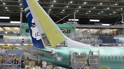 Boeing employees work on the 737 MAX on the final assembly line at Boeing's Renton plant, June 15, 2022, in Washington.