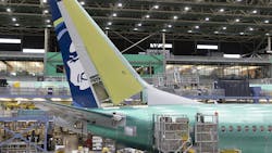 Boeing employees work on the 737 MAX on the final assembly line at Boeing's Renton plant, June 15, 2022, in Washington. Boeing employees work on the 737 MAX on the final assembly line at Boeing's Renton plant, June 15, 2022, in Washington.