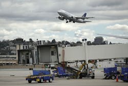 An United Airlines left takes off from San Diego International Airport headed for Houston on March 24, 2020. The airport has seen a dramatic drop in travel since the outbreak of coronavirus.