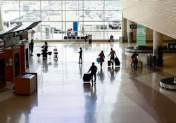 SAN JOSE, CALIFORNIA - FEBRUARY 20: Passengers walk inside Norman Y. Mineta San Jose International Airport in San Jose, Calif., on Sunday, Feb. 20, 2022.