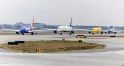 Jets line up at Hartsfield-Jackson Atlanta International Airport on Tuesday, December 13, 2022. Jets line up at Hartsfield-Jackson Atlanta International Airport on Tuesday, December 13, 2022.