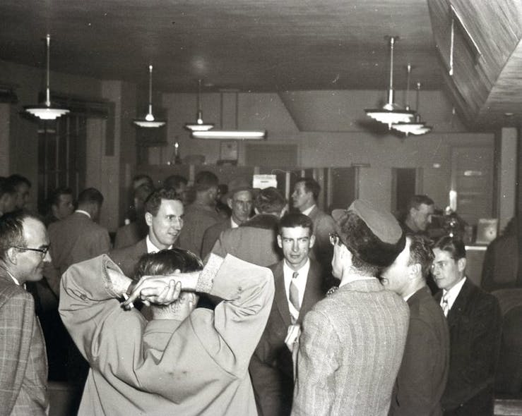 Aviation enthusiasts gather at Curtiss-Wright Airport, now Timmerman Airport, in Milwaukee on Jan. 26, 1953, to organize the group that would be named the Experimental Aircraft Association.