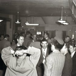 Aviation enthusiasts gather at Curtiss-Wright Airport, now Timmerman Airport, in Milwaukee on Jan. 26, 1953, to organize the group that would be named the Experimental Aircraft Association.
