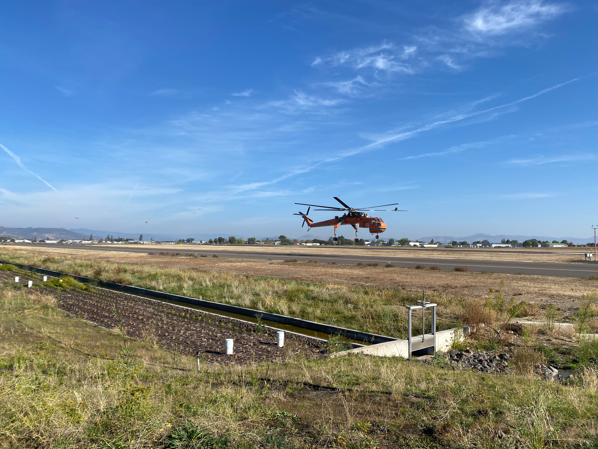 The flume inlet control structure is parallel to Taxiway A,