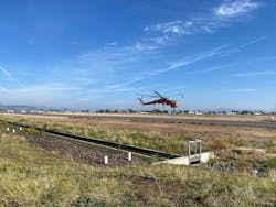 The flume inlet control structure is parallel to Taxiway A, The flume inlet control structure is parallel to Taxiway A,