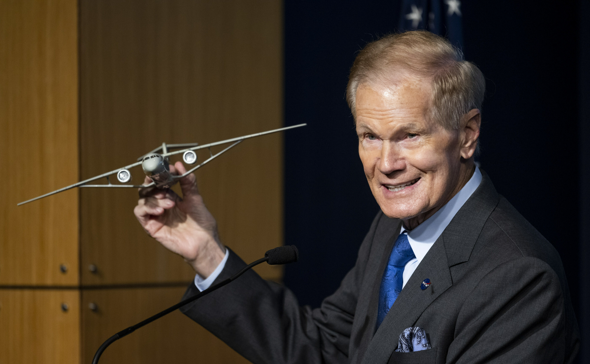 NASA Administrator Bill Nelson holds a model of an aircraft with a Transonic Truss-Braced Wing during a news conference on NASA's Sustainable Flight Demonstrator project, Wednesday, Jan. 18, 2023, at the Mary W. Jackson NASA Headquarters building in Washington, DC. Through a Funded Space Act Agreement, The Boeing company and its industry team will collaborate with NASA to develop and flight-test a full-scale Transonic Truss-Braced Wing demonstrator aircraft.