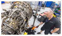 Airframe and Power Plant mechanics work on a Gear Turbine engine in Delta&apos;s new facility Tuesday, Feb. 7, 2023.