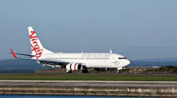 A Virgin Australia Airlines Boeing 737 jet on a runway, May 7, 2011, in Sydney.