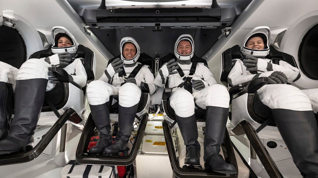 In this handout provided by NASA, NASA astronauts, from left, Jessica Watkins, Robert Hines, Kjell Lindgren, and European Space Agency astronaut Samantha Cristoforetti are seen inside the SpaceX Crew Dragon Freedom spacecraft onboard the SpaceX recovery ship Megan shortly after having landed in the Atlantic Ocean off the coast of Jacksonville, Florida, Friday, Oct. 14, 2022.
