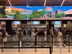 Passengers at Newark Airport's new Terminal A wait in line after a security breach shut down a checkpoint and caused a back-up.