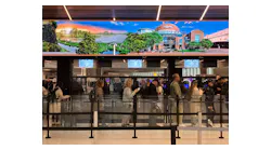 Passengers at Newark Airport's new Terminal A wait in line after a security breach shut down a checkpoint and caused a back-up.