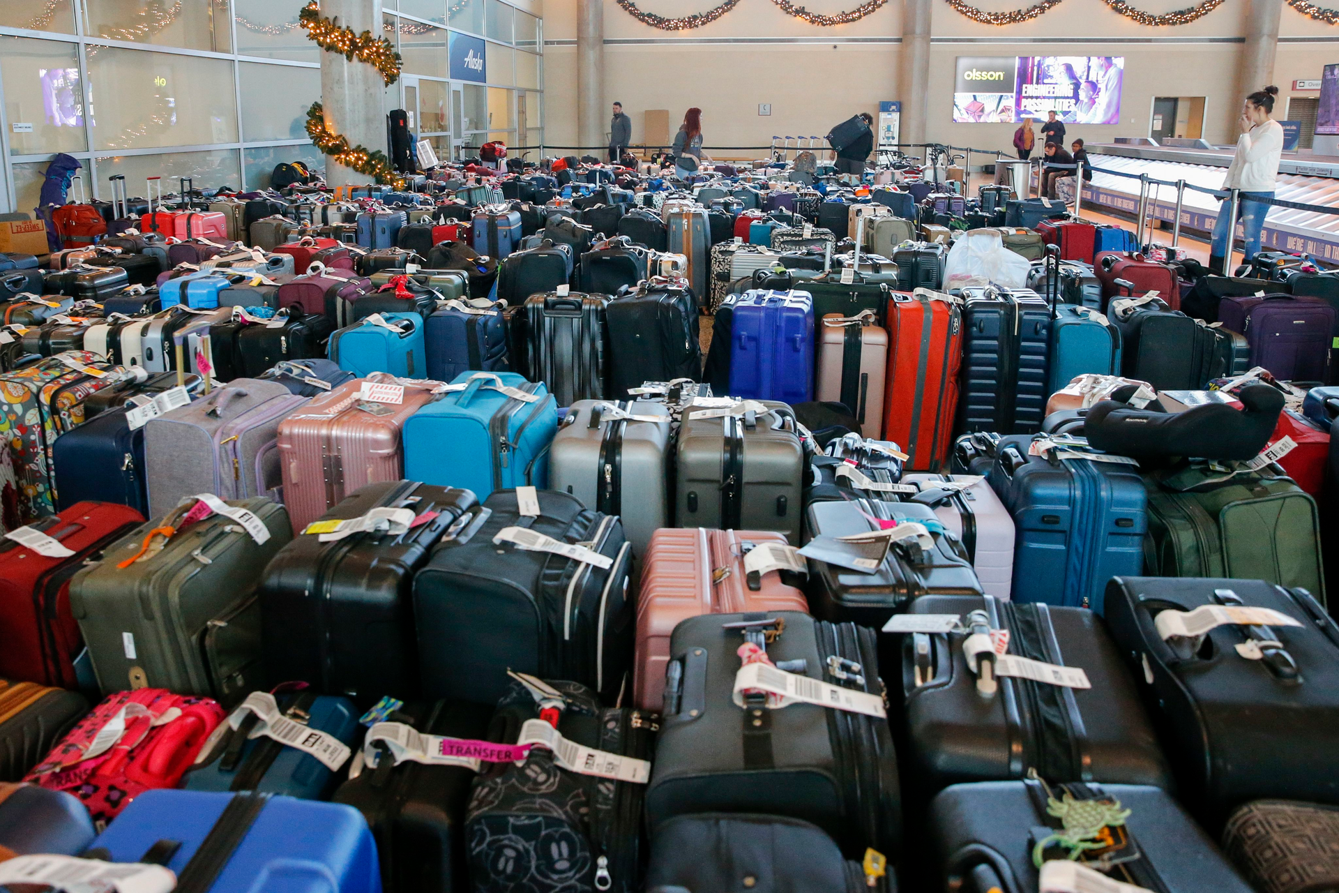 Hundreds of unclaimed bags sat outside the Southwest Airlines baggage service office at Dallas Love Field Airport on Dec. 28.