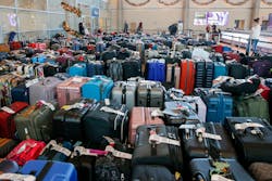 Hundreds of unclaimed bags sat outside the Southwest Airlines baggage service office at Dallas Love Field Airport on Dec. 28.