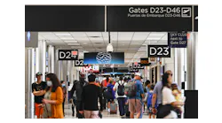 Passengers walk through Concourse D at Hartsfield-Jackson International Airport on Thursday, July 7, 2022.